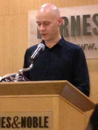 Max Barry speaking at a podium at Barnes and Noble, New York